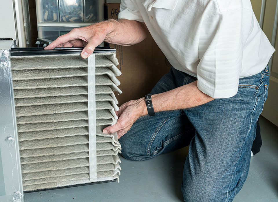 Changing an air filter in an HVAC furnace system e