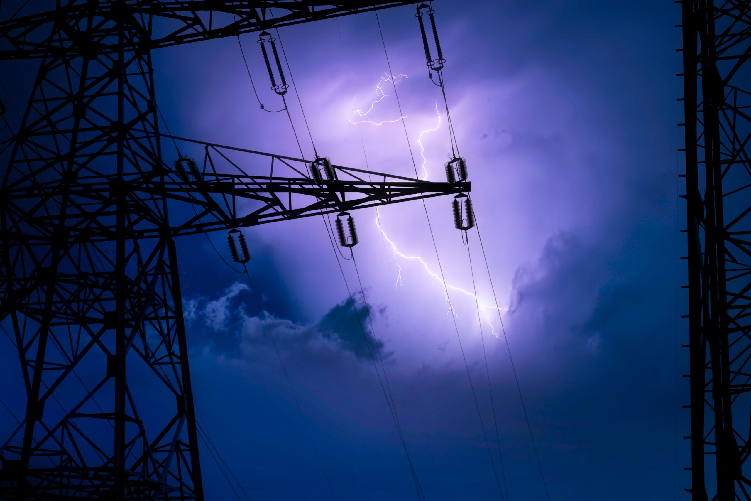 High voltage transmission tower in a lightning storm